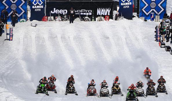 ASPEN, CO - JANUARY 27:  Racers leave the start in the Snowmobile Snocross at Winter X Games Aspen 2013 at Buttermilk Mountain on January 27, 2013 in Aspen, Colorado.  (Photo by Doug Pensinger/Getty Images)
